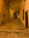 Narrow street at the Sassi of Matera in the night, Matera, Italy
