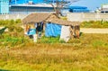 Slum shelter and industrial facility, Yangon, Myanmar Royalty Free Stock Photo