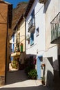 Narrow street of spanish village in summer day. Tarazona Royalty Free Stock Photo