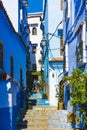 Narrow street with stairs in Chefchaouen medina Royalty Free Stock Photo