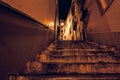 night landscape of Lisbon street with stairs next to Lisbon Cathedral. City of Lisbon in Portugal in evening