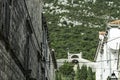 Narrow street in Ston with Great Wall in background in Ston, Croatia Royalty Free Stock Photo