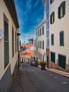 A narrow street on a sunny day in the Old Town area of Funchal on the island of Maderia, Portugal