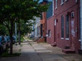 Narrow street surrounded by stony buildings in Hampden