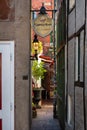 Narrow street to a restaurant in Schnoor quarter Bremen, Germany. Street view. Tourist destination