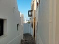 The narrow street in the town of Lindos, Rhodes, Greece Royalty Free Stock Photo