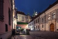 Narrow street with view of Wawel castle at night in Krakow, Poland Royalty Free Stock Photo