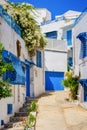 Narrow streets of the city in the Andalusian style in white-blue colors