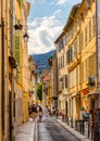 Narrow streets and colorful historic houses of old town with Avenue Isnard street in medieval riviera resort of Vence in France