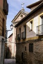 Narrow streets and Facades of historic houses in Toledo Royalty Free Stock Photo