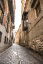 Narrow streets and historical facades in the old town of Toledo Royalty Free Stock Photo