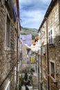 Narrow streets lead down to the city center