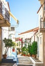 Narrow streets of Neorio town in Poros island, Greece; Old whit Royalty Free Stock Photo