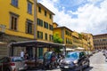 Traditional old street outdoor restaurants seating Florence Tuscany Italy