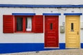 Narrow streets and white houses of Porto Covo town in Portugal