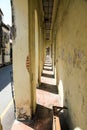 Narrow sunny alley, old town somewhere in asia Royalty Free Stock Photo