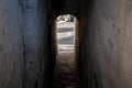 Narrow tunnel passage between buildings at Szentendre, Hungary