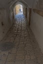 Narrow Tunnel Sidewalk in an Old City