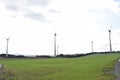 wind power plants on green hills