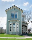 Narrow Blue House with Bay Window Royalty Free Stock Photo