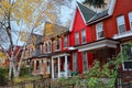 Narrow Victorian row houses with gables