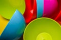 Narrow view of a colorful group of plastic bowls - abstract colorful background
