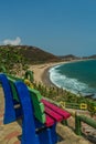 Narrow view of seashore from unoccupied coloured stone chair at Viewpoint, Kailashgiri, Visakhapatnam, AndhraPradesh March 05 2017 Royalty Free Stock Photo