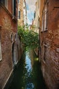 Narrow water canal in Venice