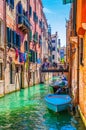Narrow water canal waterway in Venice, Italy