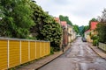 Narrow wet street with ancient houses in small coastal town Tammisaari Ekenas, Finland, after rainstorm