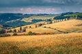 Narrow winding rural road with cypresses in Tuscany, Italy, Europe Royalty Free Stock Photo