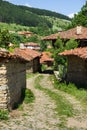 The narrow winding street in the Balkan village Royalty Free Stock Photo