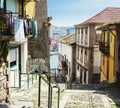 Narrow winding street in the old town of Porto Ribeira district, Portugal