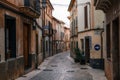 Narrow winding streets in Pollensa with its traditional stone houses