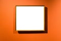 Narrow wooden picture frame on orange wall Royalty Free Stock Photo