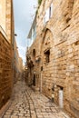 Long narrow Yaffa street and strip of sky