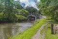 Narrowboat on a British canal in rural setting Royalty Free Stock Photo