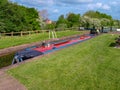 Narrowboat in canal lock. Royalty Free Stock Photo