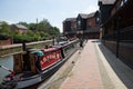 Narrowboats moored by Banbury Lock at The Castle Quay Shopping Centre in Banbury, Oxfordshire, UK