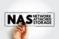 NAS Network-Attached Storage - file-level computer data storage server connected to a computer network, acronym text stamp concept Royalty Free Stock Photo