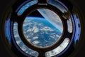 NASA provided the space station window view of Earth for this photograph