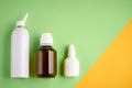 Nasal spray bottle composition, white template bottle on yellow and green background