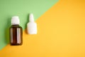 Nasal spray bottle composition, white template bottle on yellow and green background