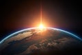 NASAs original photograph of planet Earth with the sun rising from outer space