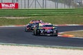 Nascar racing car action on asphalt circuit race track