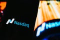 Nasdaq logo on mobile phone screen. Royalty Free Stock Photo