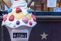 Nashville, Tennessee - January 10, 2022: Exterior sign and giant fake sundae at Mike`s Ice Cream in downtown Nashville