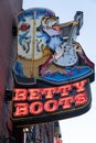 Neon sign for the famous Betty Boots shoe store, selling cowboy apparel