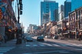 VIew of lower Broadway and Honky Tonk Row, featuring bars with live music, popular with