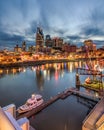 Nashville, Tennessee - March 23, 2019 : The Nashville skyline reflecting in the Cumberland River on the waterfront Royalty Free Stock Photo